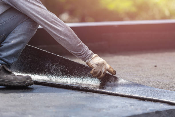 Professional Basement Waterproofing technician working in Ardmore, PA